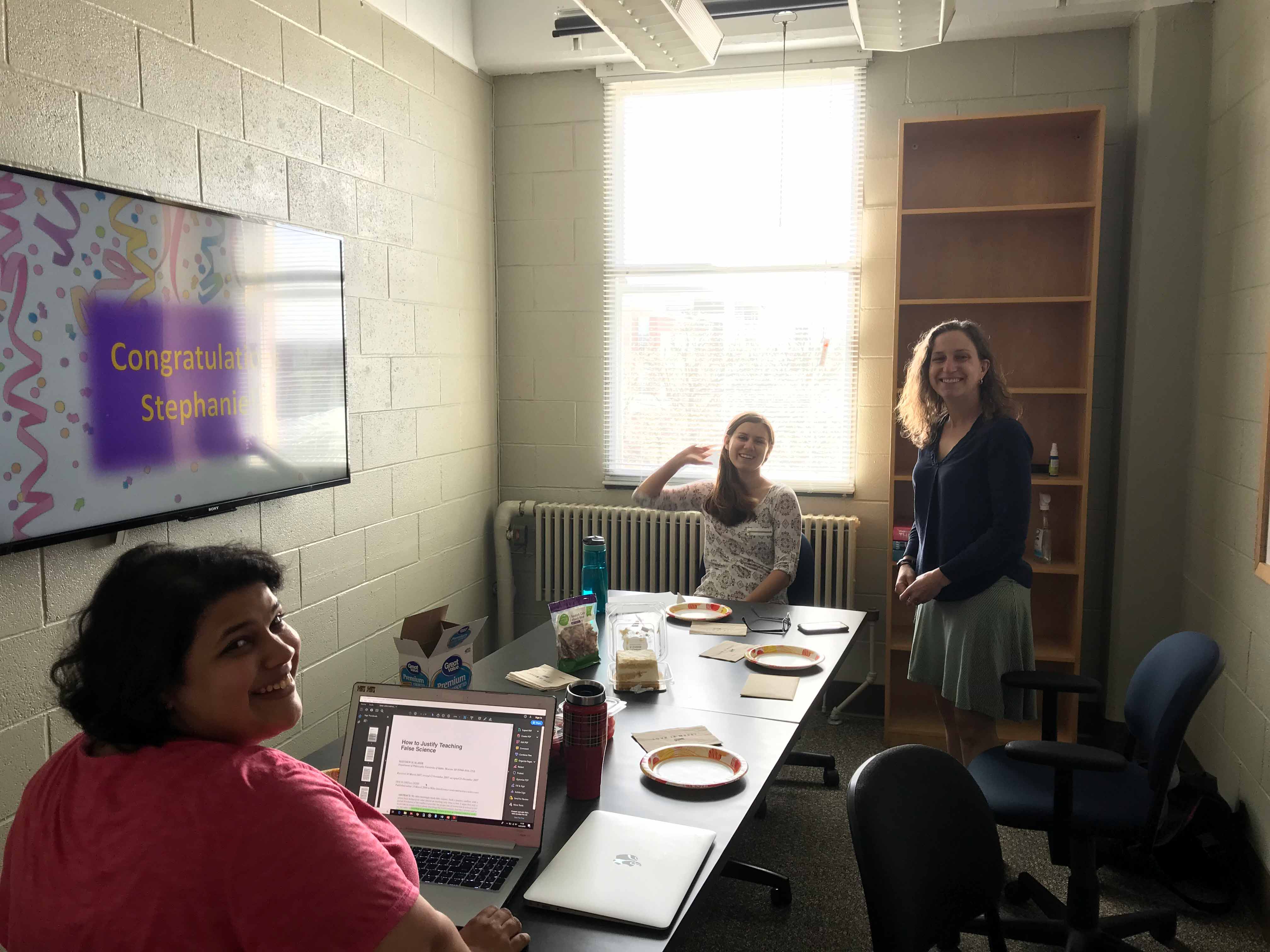 Anupriya, Sharleen, and Stephanie celebrate Stephanie's promotion