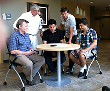 The Purdue research team meets to discuss recent research results.