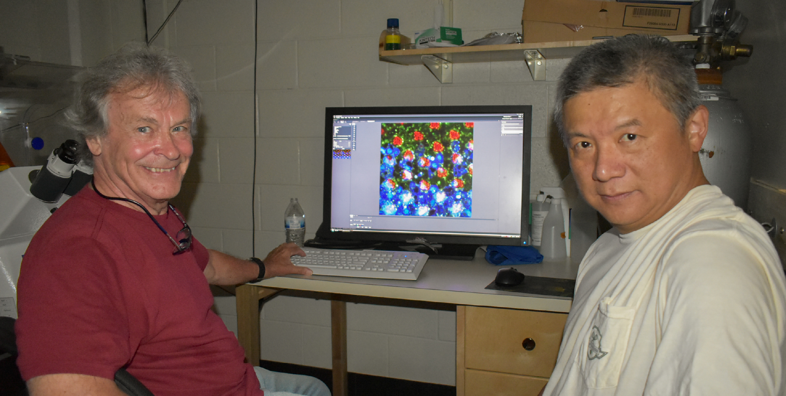 Don Ready and Henry Chang in their lab