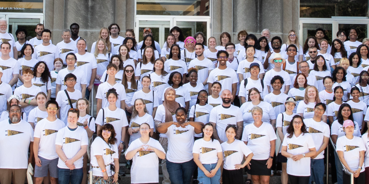 Group photo of members of Purdue Biological Sciences standing on the steps of Lilly Hall
