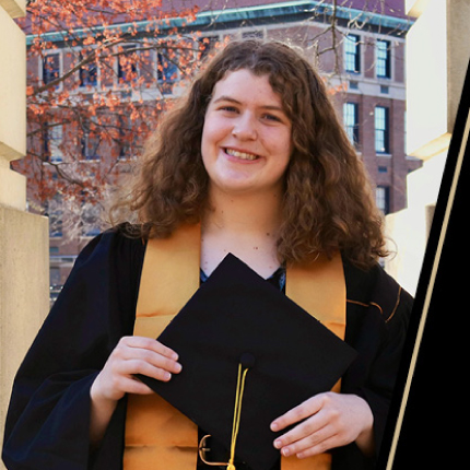 Claire Wolfer-Jenkins holds her diploma on the Purdue University campus